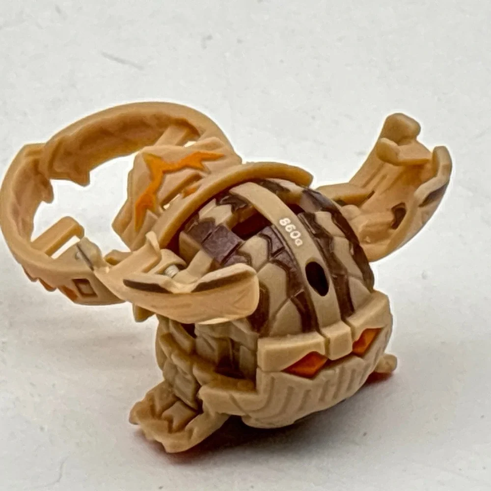 Bakugan Subterra Gyrazor Gundalian Invaders Brown Tan Spinner Cyclone Toy